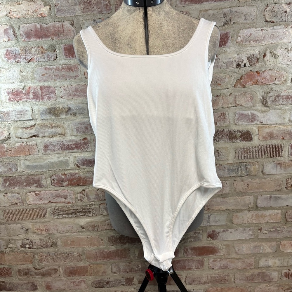 White sleeveless body suit large
